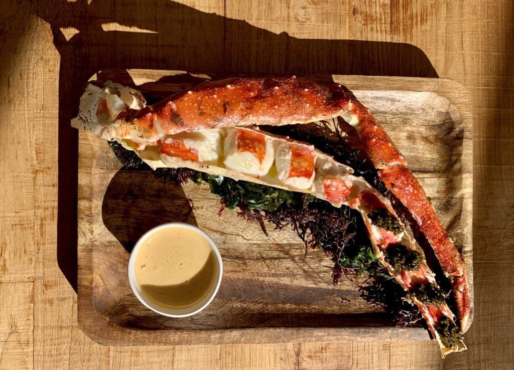 King crab gourmet dish at a beachside restaurant