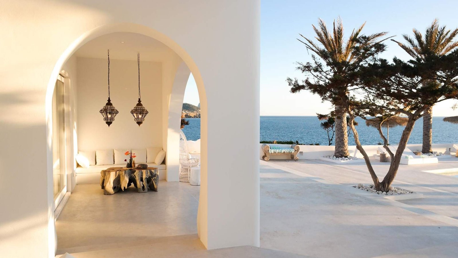 Mediterranean beach club with arched architecture and sea view